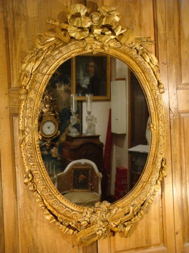 Miroirs, Trumeaux  - Miroir Louis XVI en bois sculpté