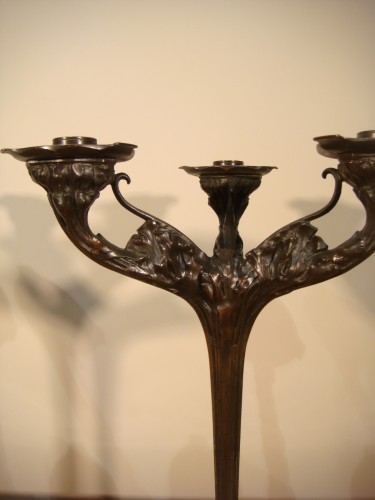 Luminaires Bougeoirs et Chandeliers - Paire de candélabres  Art nouveau en bronze