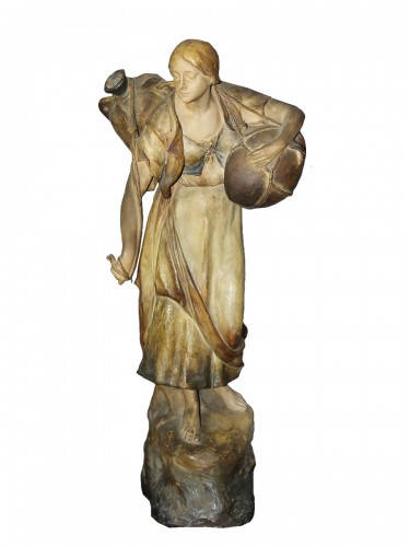 Woman with jug, terracotta by Goldscheider