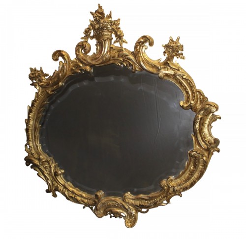 Important miroir Napoléon III en stuc doré