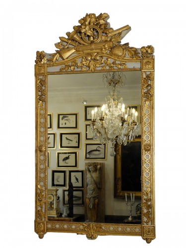 Louis XVI mirror with hunting attributes 