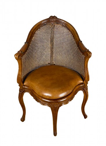 A Louis XV Canned Cabinet-armchair