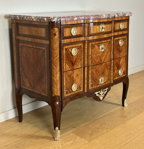 Furniture  - A Transitional ormolu-mounted marquetry commode stamped Jean Petit