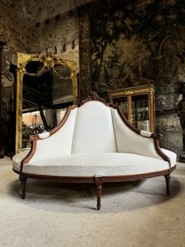 Seating  - A late 19th cenntury french bolster or center sofa of the