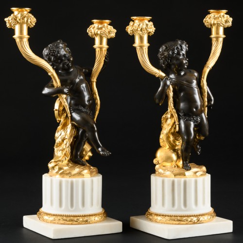 Luminaires Bougeoirs et Chandeliers - Paire de candélabres  aux Putti d’époque Louis XVI