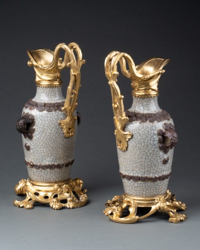 Antiquités - Pair of small celadon porcelain ewers, Paris circa 1750