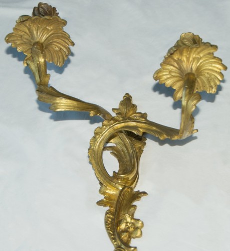 Lighting  - Paris, 18th century - Pair of gilt bronze wall sconces, Louis XV period.