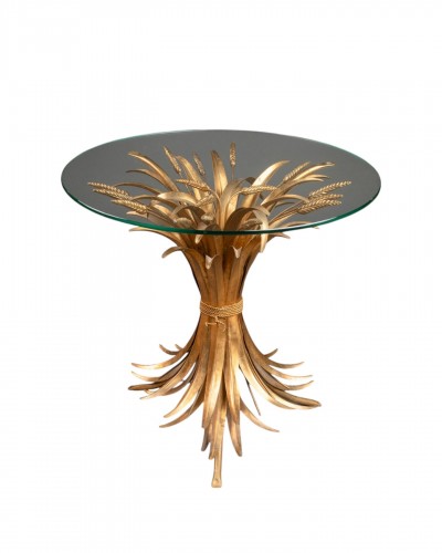 Pedestal table in gilded brass and glass