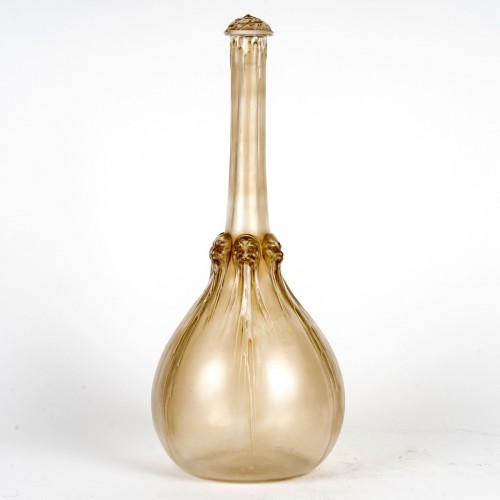 Verrerie, Cristallerie  - 1914 René Lalique - Carafe Art Nouveau Six Têtes patiné sépia