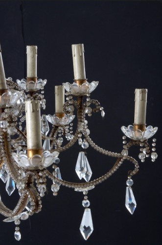 Antiquités - Pair of 19th century 12-light gilded iron chandeliers with pendants