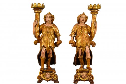 Paire de sculptures porte-torchères en bois laqué et doré, Italie XVIe siècle