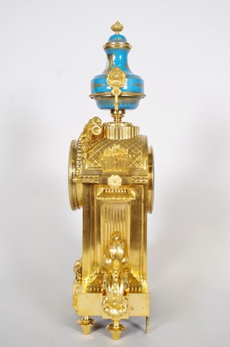 Antiquités - Pendule d'époque Napoléon III en bronze doré et porcelaine