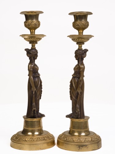 Lighting  - Pair of Empire period patinated and gilt bronze candlesticks