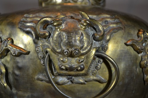 Asian Works of Art  - Gilded copper vase, applied with Phoenix and Lions, China Qing dynasty