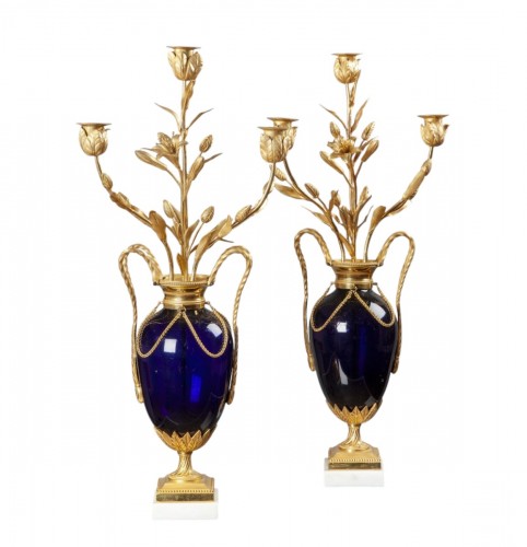 Pair of French Louis XVI ormolu three light vase candelabra