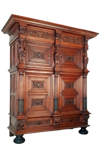 A large oak cupboard from the first half of the 17th century