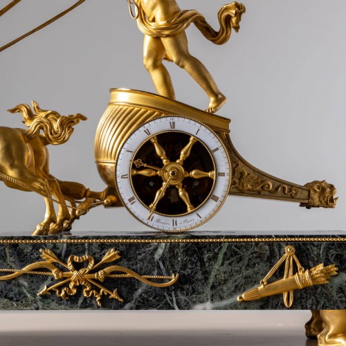 Horlogerie Pendule - Horloge de cheminée Empire "au Char de l'Amour", avec Cupidon et son char