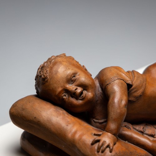 19th century - Reclining infant in terracotta, sign. F. Sans, probably Spain, Late 19th ce