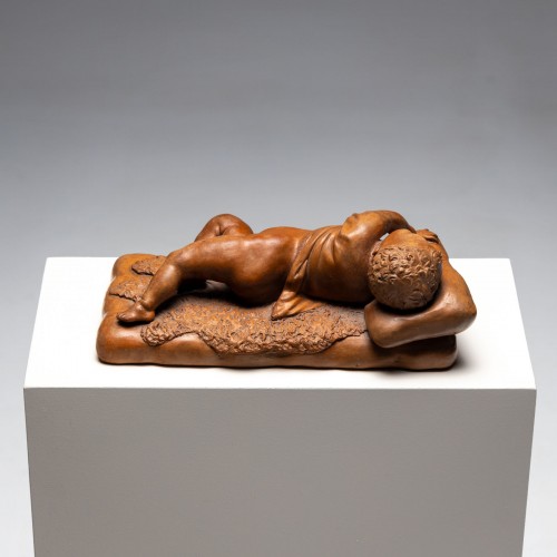  - Reclining infant in terracotta, sign. F. Sans, probably Spain, Late 19th ce