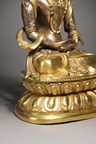 Antiquités - Bronze doré figurant le Bouddha Amitayus