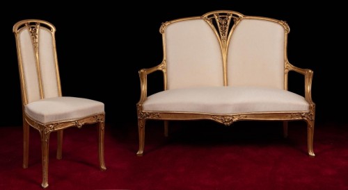 Sofa and chair in gilded and carved wood by Louis Majorelle - 