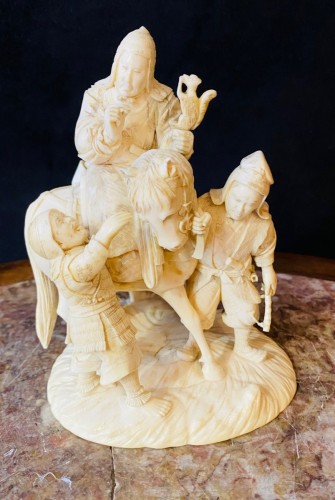  - One-piece ivory Okimono, depicting a warrior on horseback with squires Japan, Meiji period