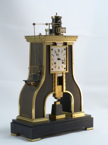 Marteau pilon, pendule dite industrielle par Guilmet - Horlogerie Style 