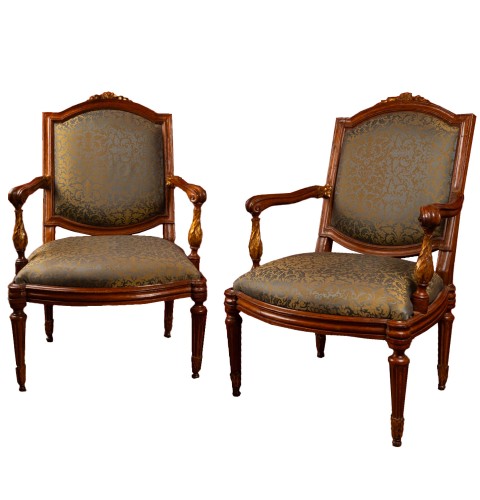 Fauteuils génois en noyer sculpté, teinté et doré, ca. 1770