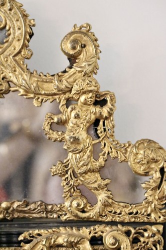 Mirrors, Trumeau  - A Flemish embossed brass mirror, 17th century