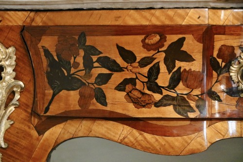 18th century - A rare pair of Louis XV marquetry console commodes 