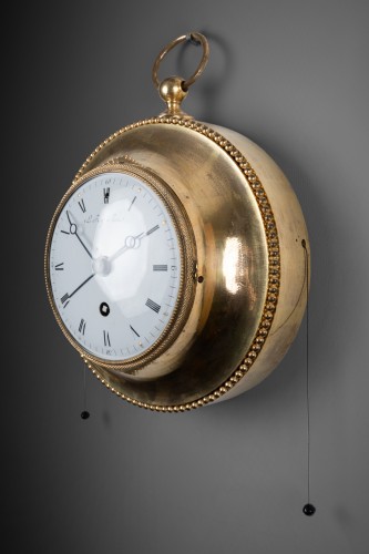 Antiquités - An Empire gilt-bronze alarm cartel clock