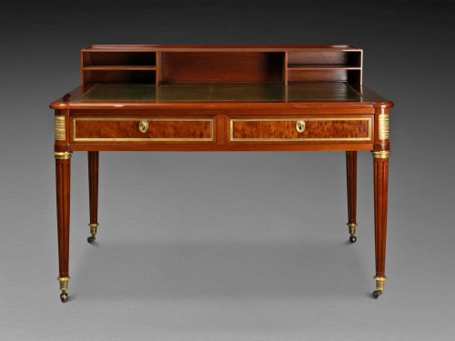 18th century - Jean Baptiste Courte. A Louis XVI mahogany bureau plat