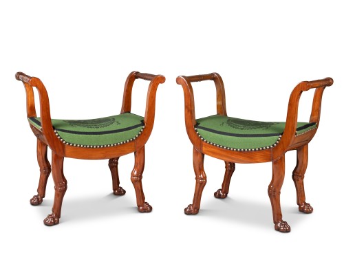 A pair Empire of X-shaped mahogany stools