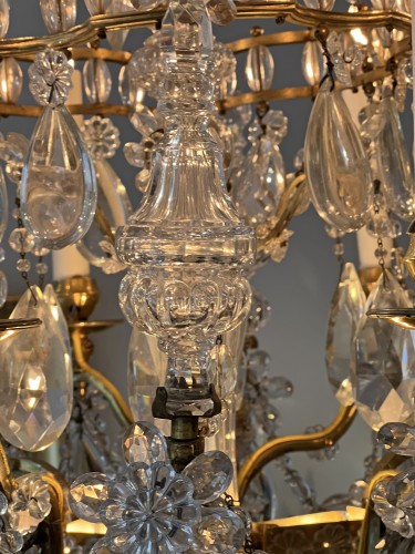 Antiquités - A French ormolu and cut crystal glass six-light chandelier