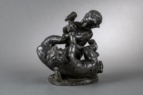 Sculpture  - Groupe de putti combattant un cygne en plomb Bronzé