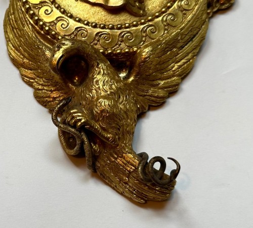 A gilt brass profile of a Roman emperor - 