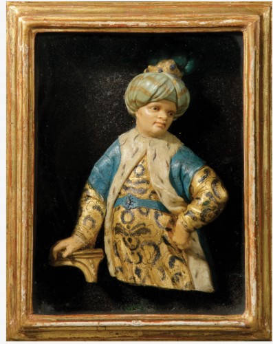 An early 18th century  wax relief of a man dressed as a Turk