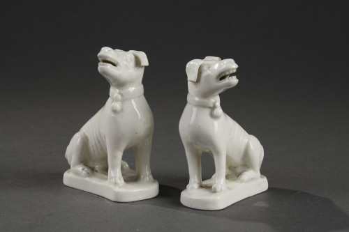 Asian Works of Art  - China Dehua Pair of sitting dog figurines KANGXI 