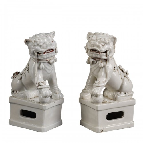 Pair of white Buddhist lions from China Dehua Kangxi period