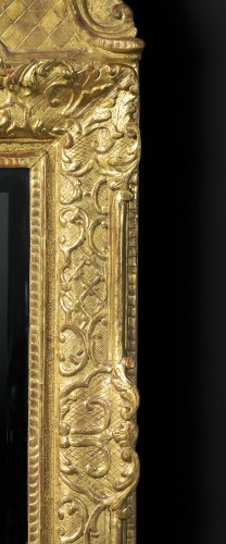 Miroirs, Trumeaux  - Miroir en bois sculpté et doré d'époque Louis XIV