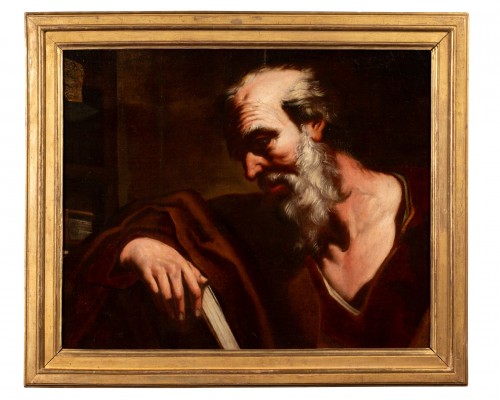 portrait of a philosopher holding a book