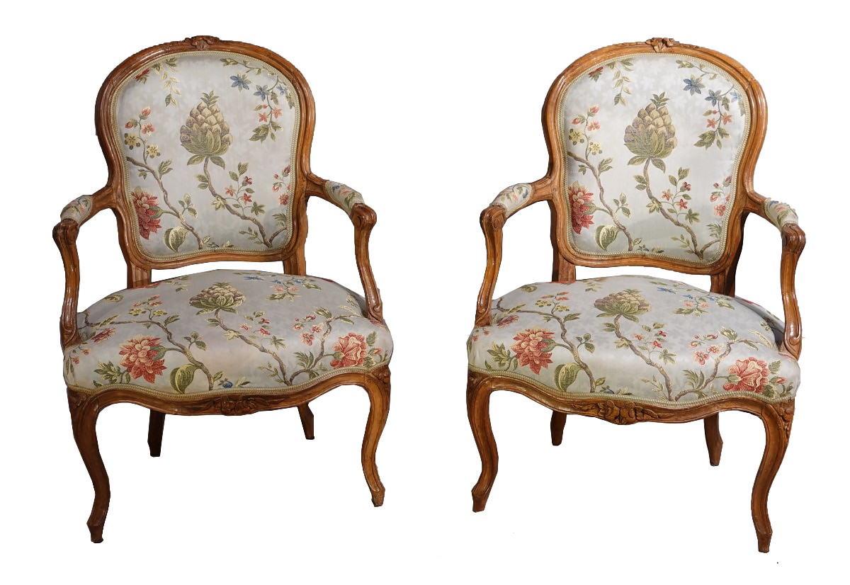 Antique French Louis XV styled walnut armchair.