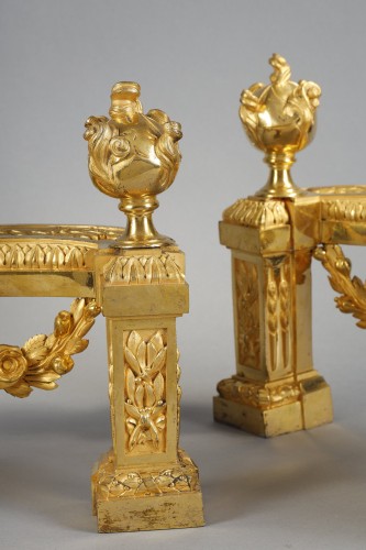 Antiquités - Pair of Louis XVI period andirons in gilded bronze