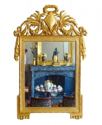 Miroir d'époque Louis XVI en bois sculpté et doré