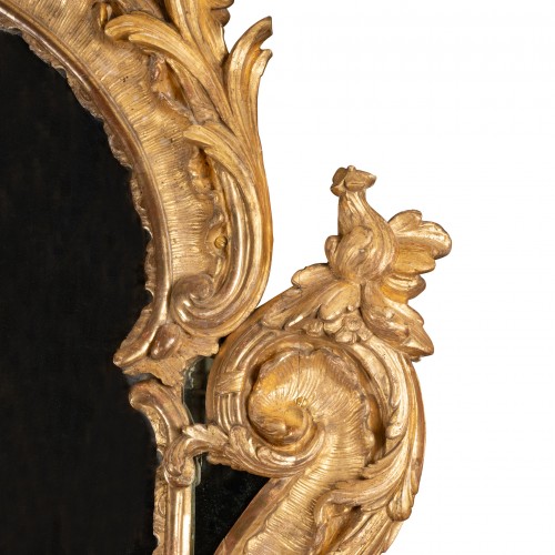 XVIIIe siècle - Miroir en bois sculpté doré d'époque Louis XV