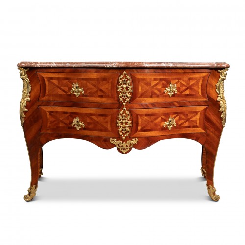 A  Louis XV ormolu and brass-mounted kingwood Commode 