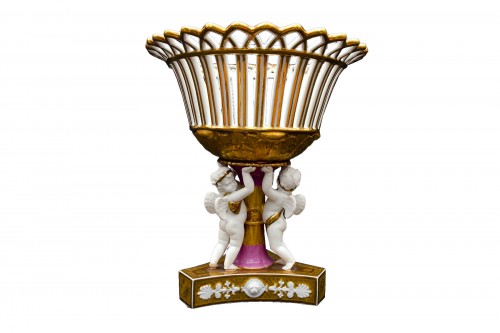 Round pink and gold basket held by angels, Coussac-Bonneval in Limoges