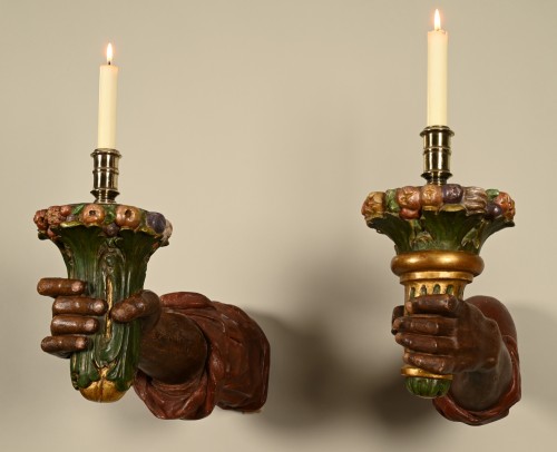 Lighting  - A pair of polychrome colonial wall arms.