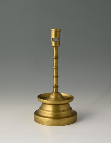 Very fine brass four-knop circular-based candlestick. - 