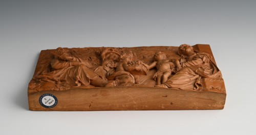 A fruitwood relief Depicting Joseph, Mary, Jesus and three cherubs bringing - 